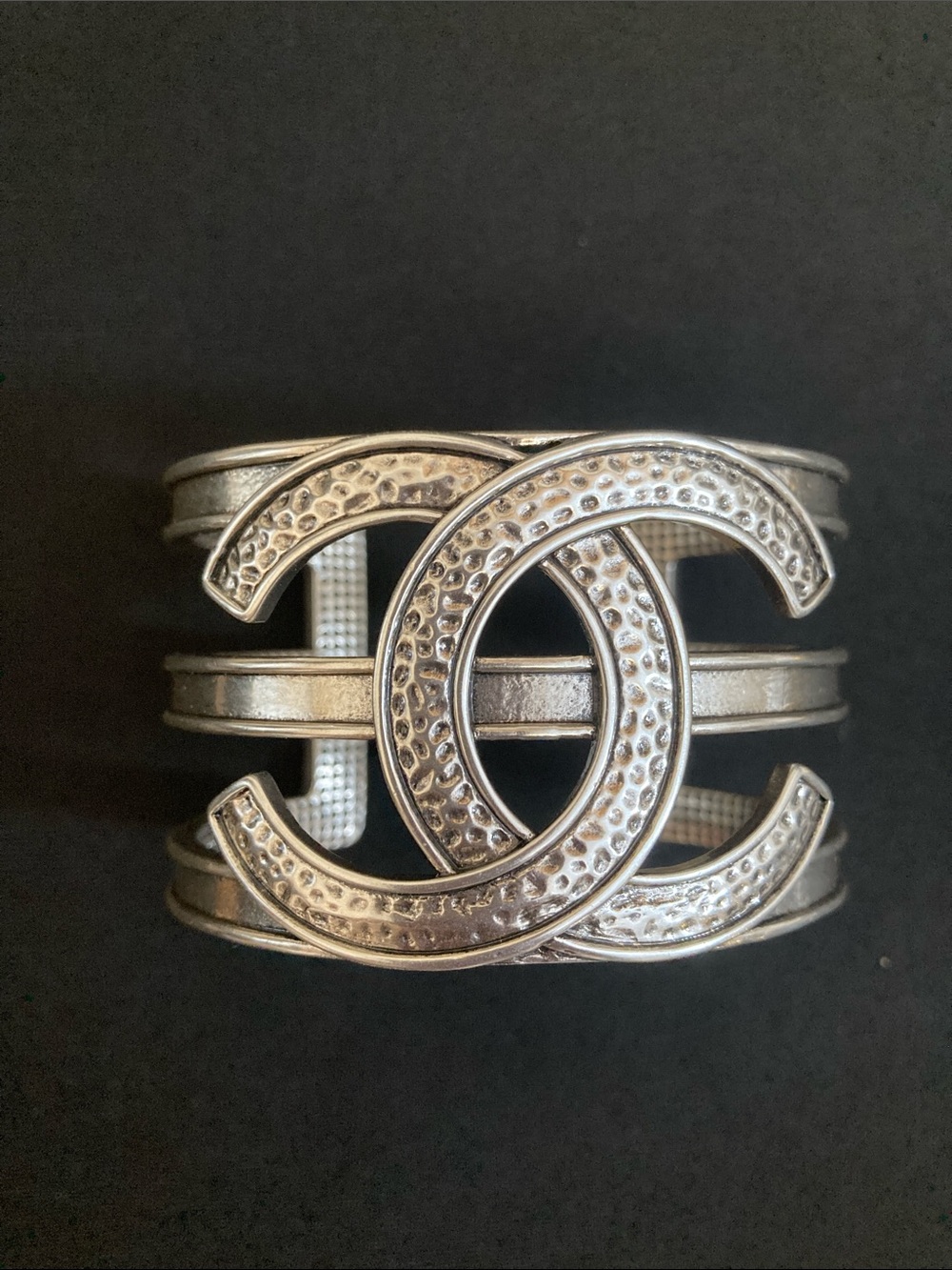 CHANEL Silver-Tone Hammered Interlocking CC Cuff Bracelet